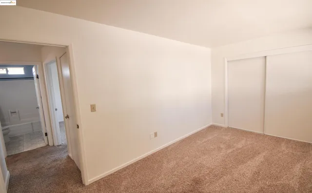 a room with furniture and a window