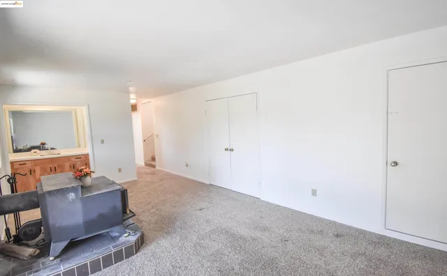 a view of empty room with windows