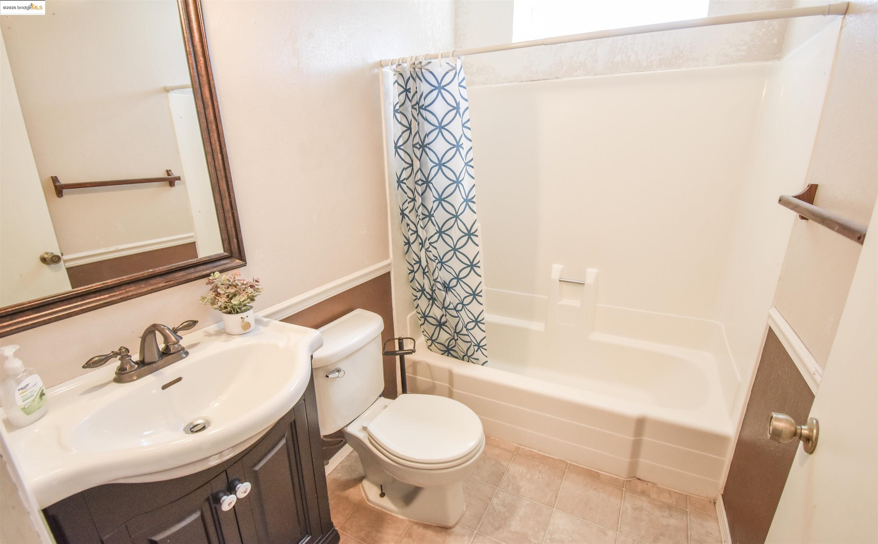 21850 Phoenix Lake Road Sonora, CA 95370 - Photo 31 of 39 a bathroom with a sink toilet and shower