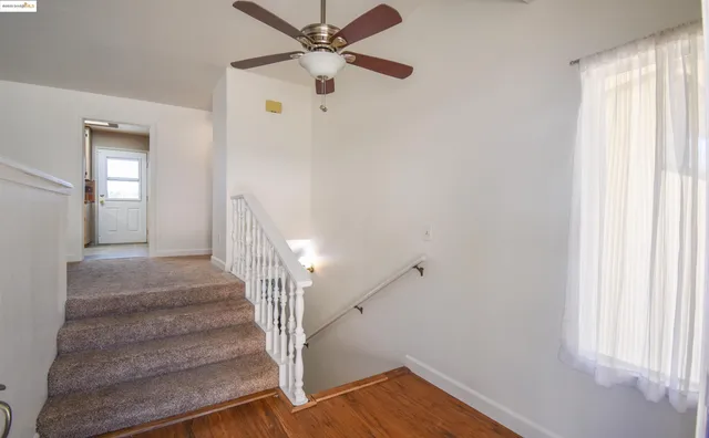 a view of entryway with wooden floor
