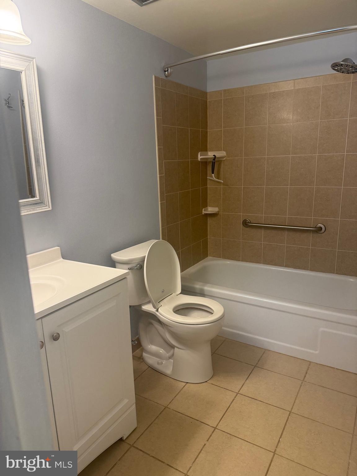 76 Old Forge Crossing, Unit 76 Devon, PA 19333 - Photo 16 of 17 a white toilet sitting next to a bathroom sink
