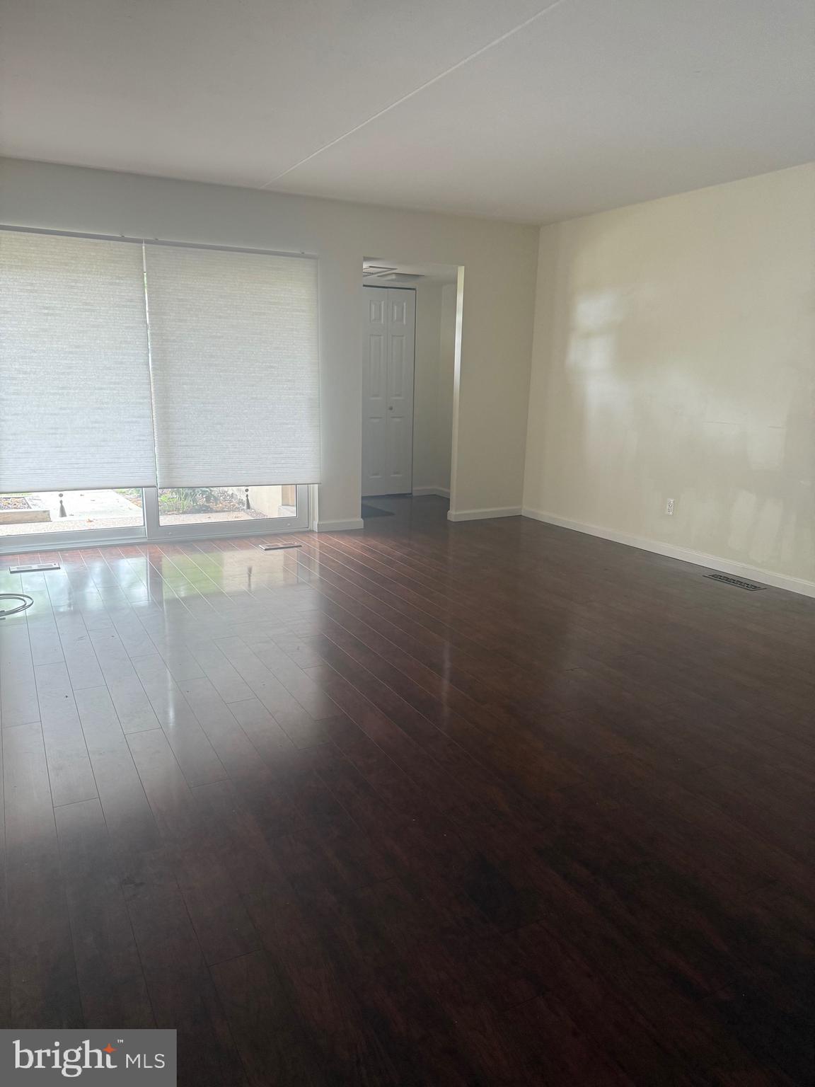 76 Old Forge Crossing, Unit 76 Devon, PA 19333 - Photo 6 of 17 a view of empty room with wooden floor