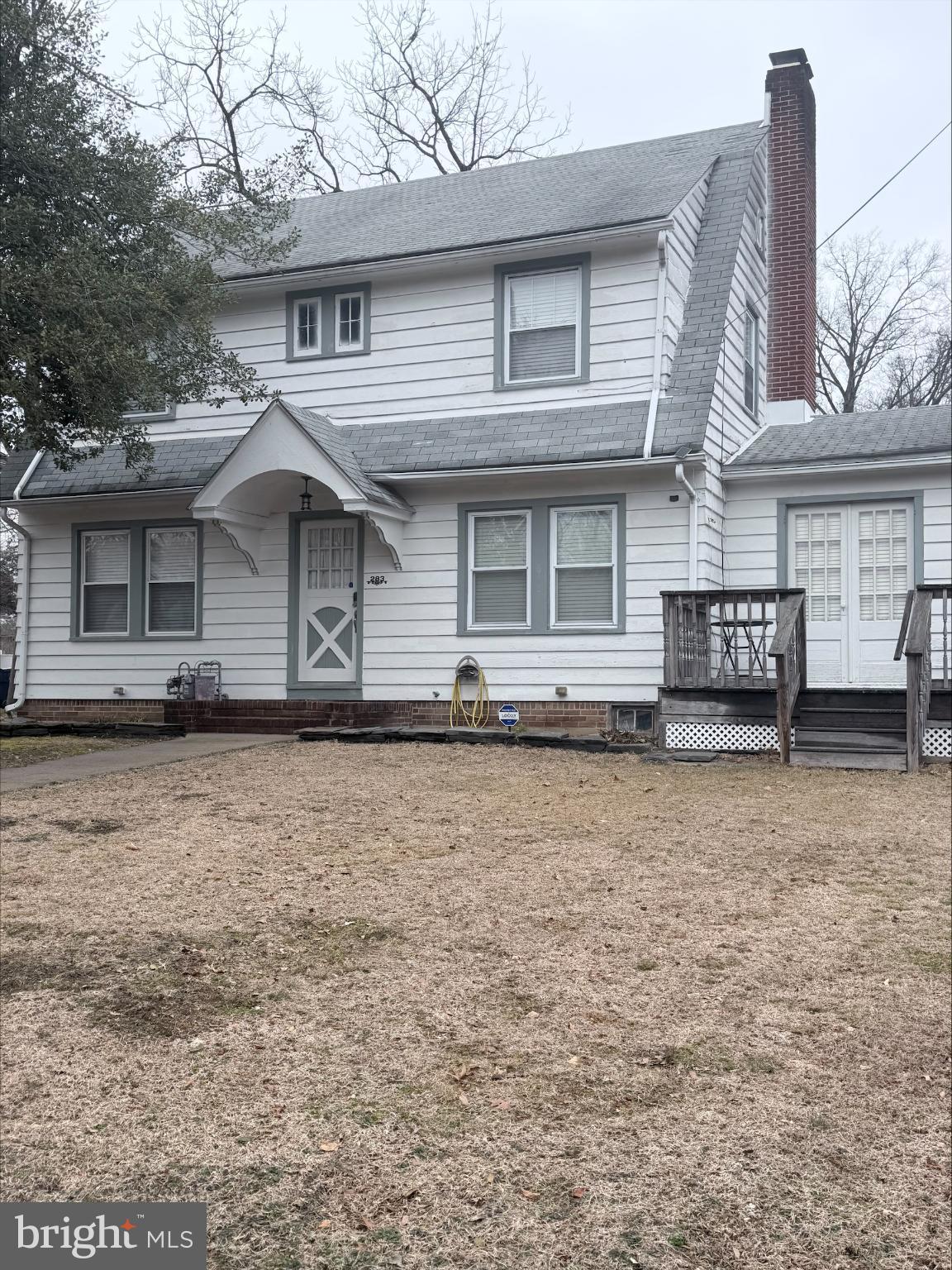 283 West Commerce St Extension Bridgeton, NJ 08302 - Photo 1 of 27 a front view of a house with a yard