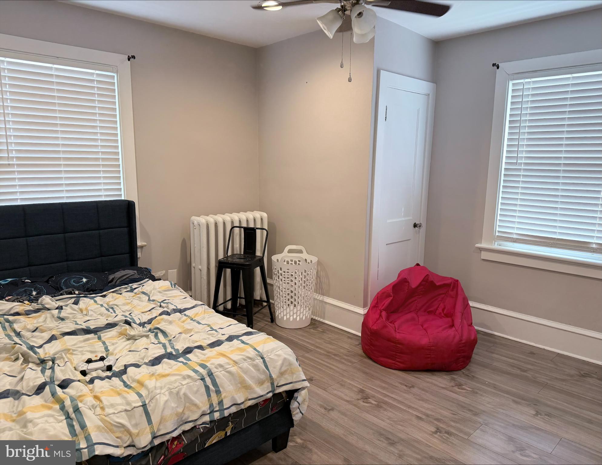 283 West Commerce St Extension Bridgeton, NJ 08302 - Photo 12 of 27 a bedroom with a bed and a chair