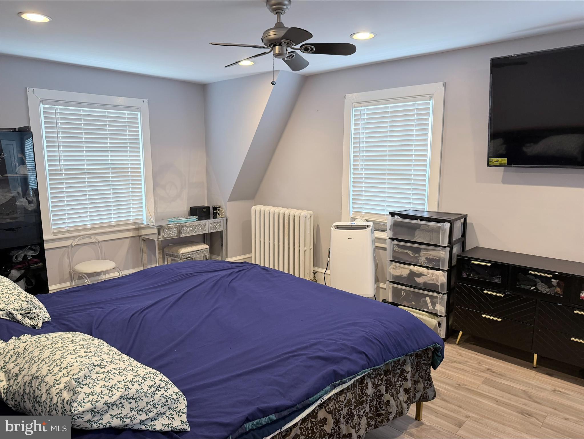 283 West Commerce St Extension Bridgeton, NJ 08302 - Photo 15 of 27 a bedroom with a bed and flat screen tv