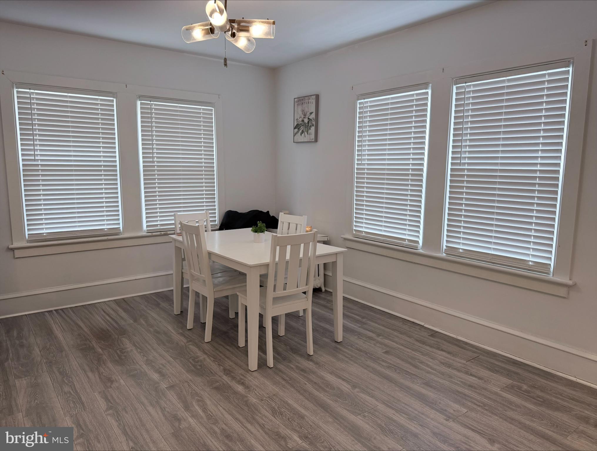 283 West Commerce St Extension Bridgeton, NJ 08302 - Photo 23 of 27 a dining room with furniture and wooden floor