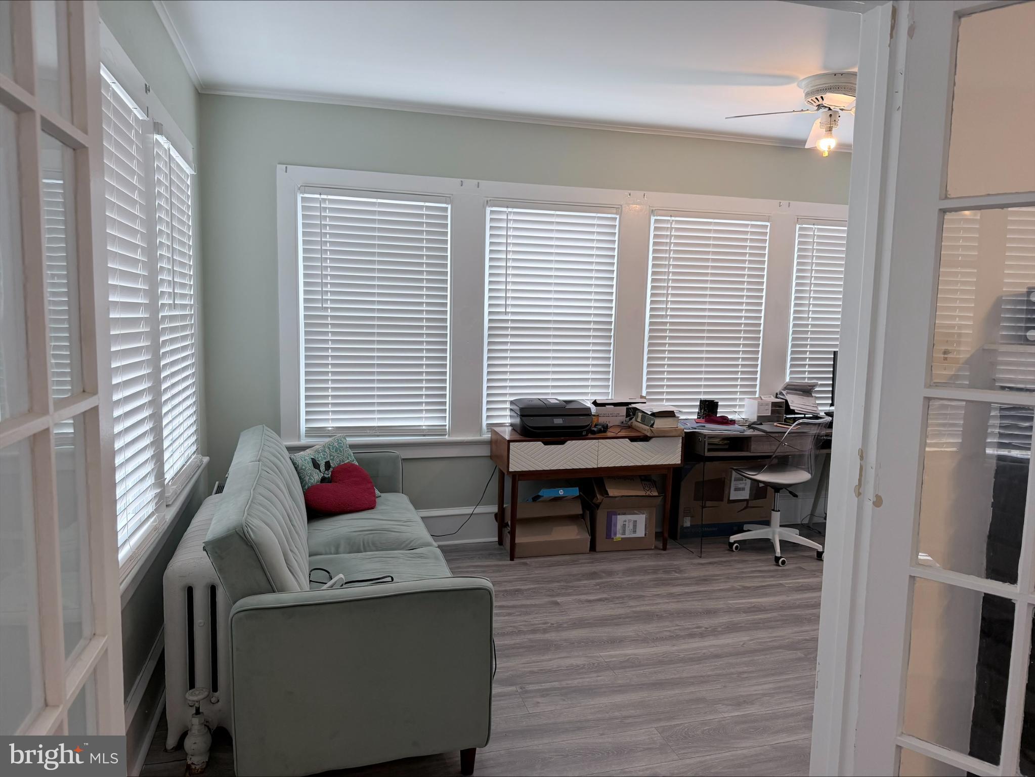 283 West Commerce St Extension Bridgeton, NJ 08302 - Photo 5 of 27 a view of a livingroom with workspace and a window