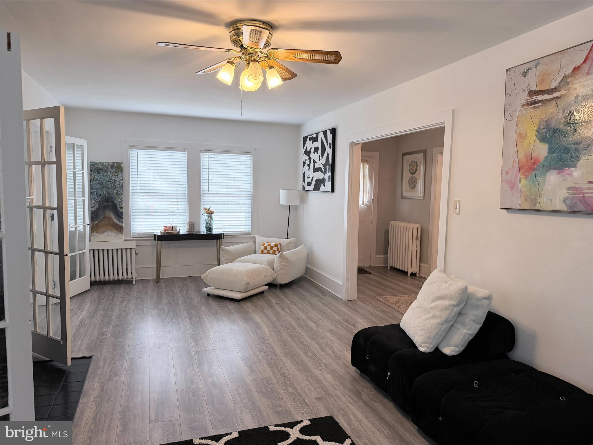 283 West Commerce St Extension Bridgeton, NJ 08302 - Photo 6 of 27 a living room with furniture and a wooden floor
