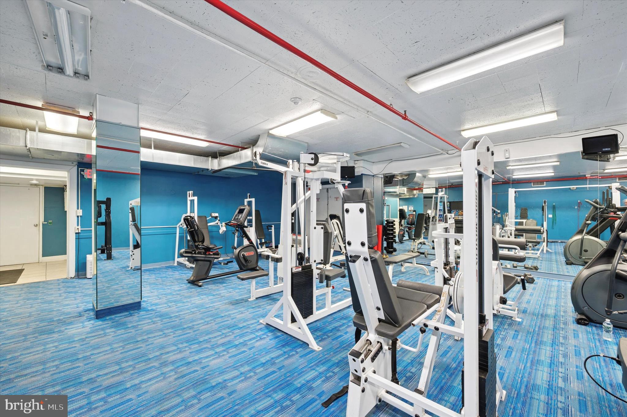 1324 Locust Street, Unit 1125 Philadelphia, PA 19107 - Photo 15 of 16 a view of a room with gym equipment