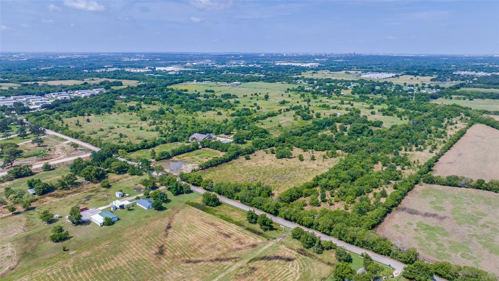 41.45-ac Collins Road Denton, TX 76208 - Photo 5 of 10 an aerial view of a city with lots of residential buildings