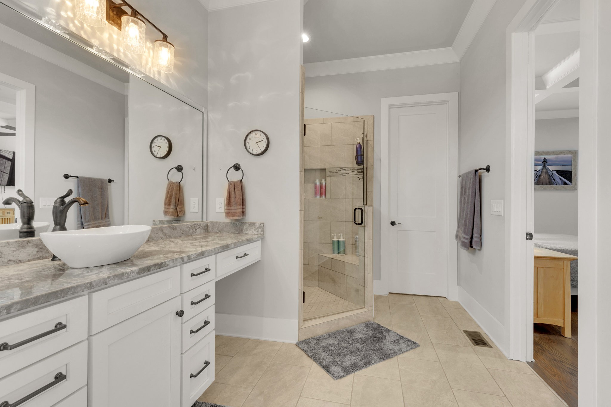 5007 Brill Ln Spring Hill Spring Hill, TN 37174 - Photo 17 of 51 a spacious bathroom with a granite countertop sink a mirror a shower and a mirror