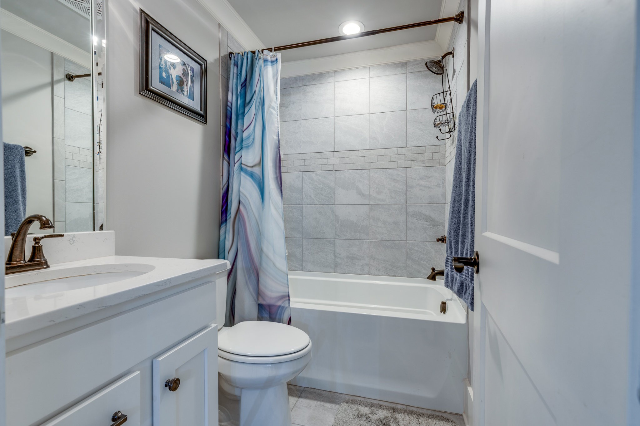 5007 Brill Ln Spring Hill Spring Hill, TN 37174 - Photo 20 of 51 a bathroom with a sink toilet and shower
