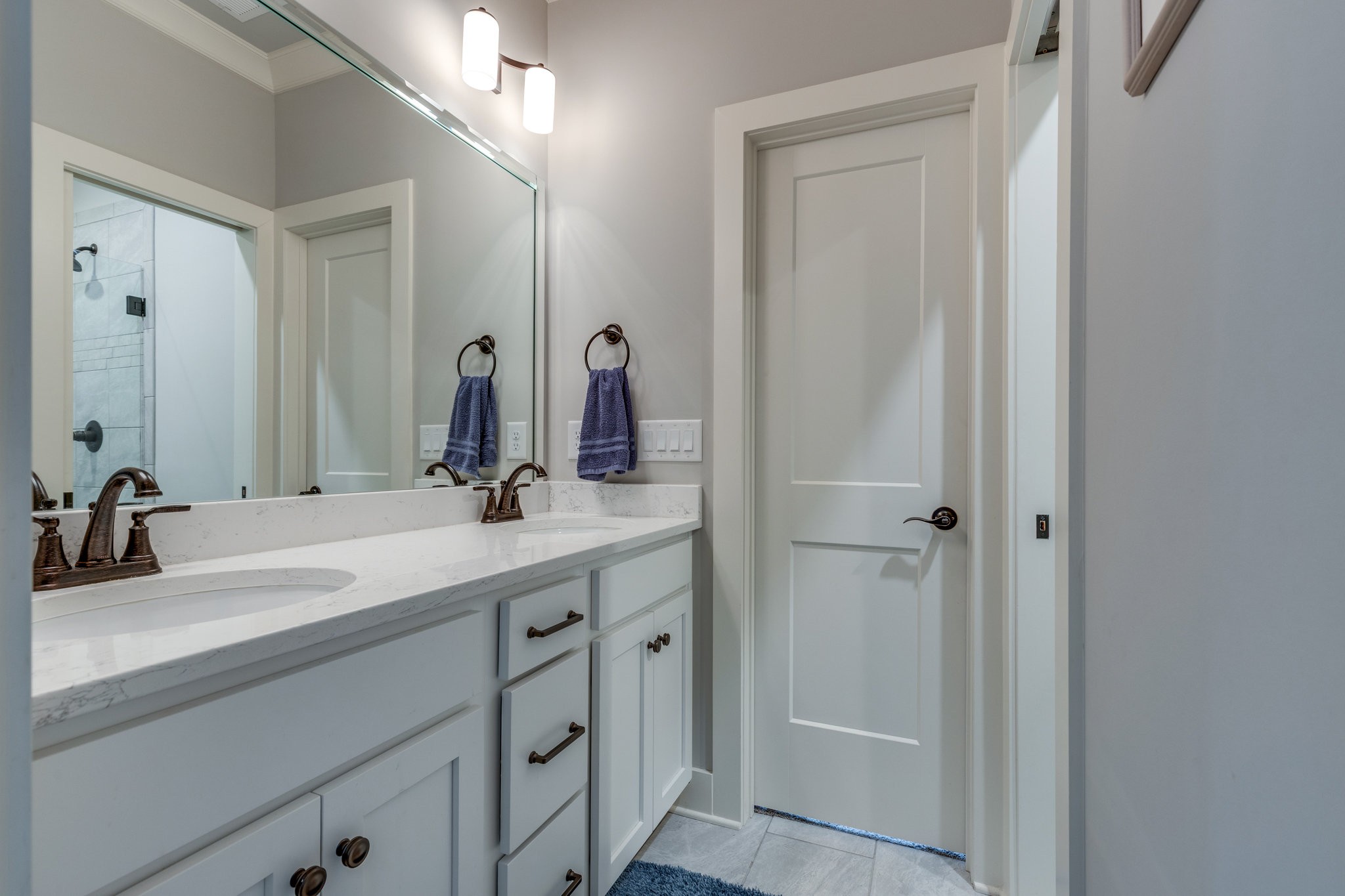 5007 Brill Ln Spring Hill Spring Hill, TN 37174 - Photo 23 of 51 a bathroom with a double vanity sink and a mirror
