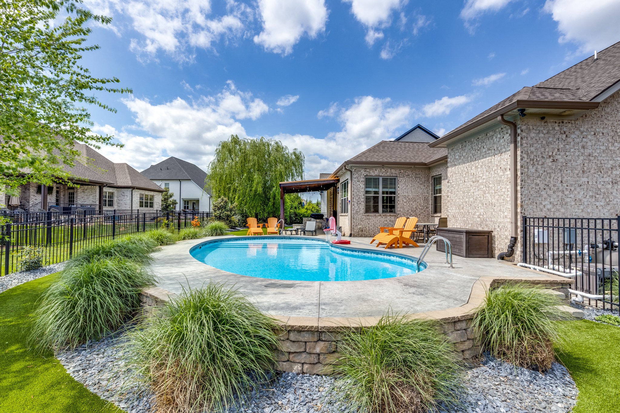 5007 Brill Ln Spring Hill Spring Hill, TN 37174 - Photo 42 of 51 a view of a house with swimming pool and sitting area