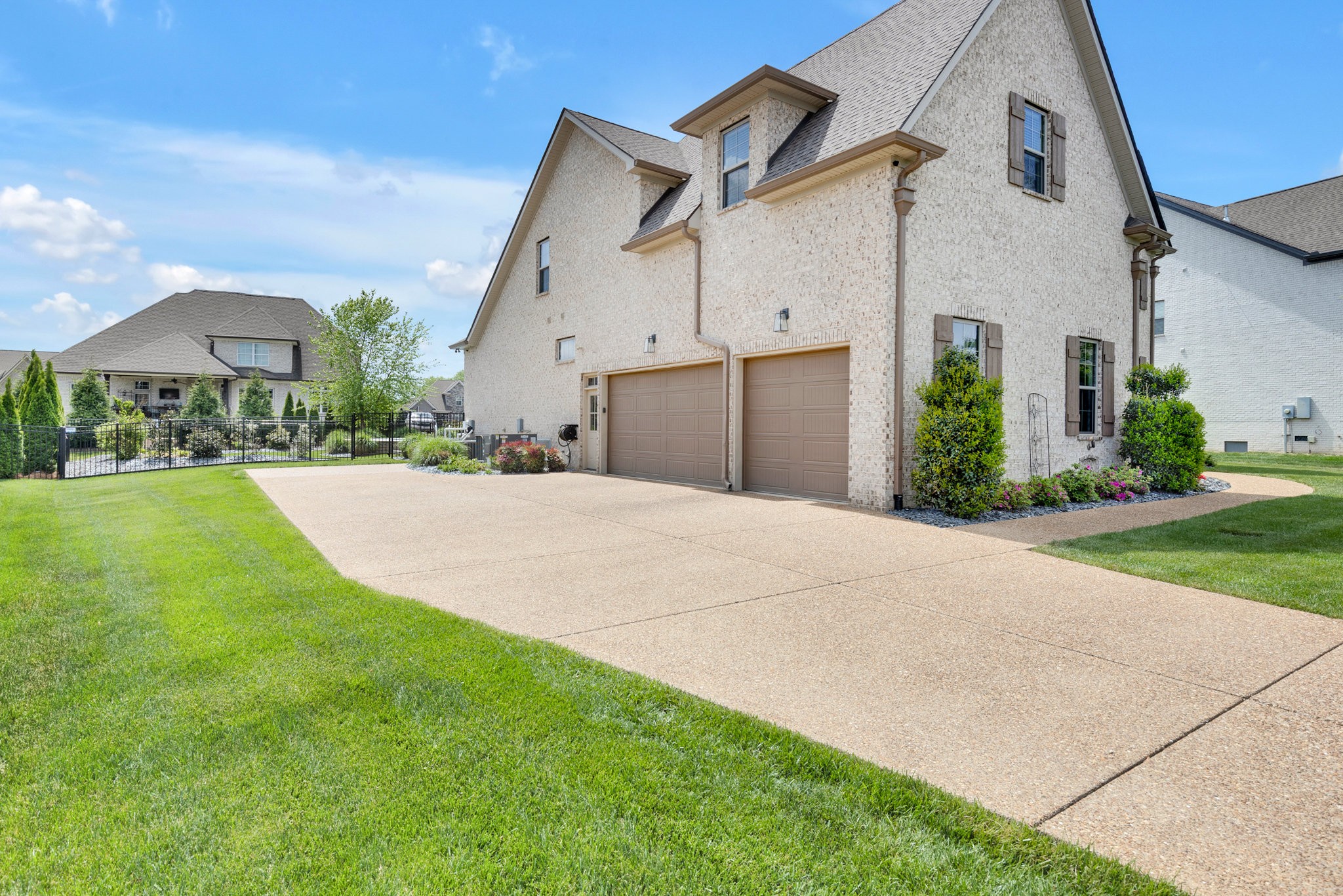 5007 Brill Ln Spring Hill Spring Hill, TN 37174 - Photo 50 of 51 a front view of a house with a yard and garage