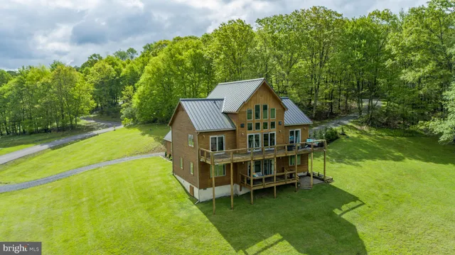 a view of a house with a big yard
