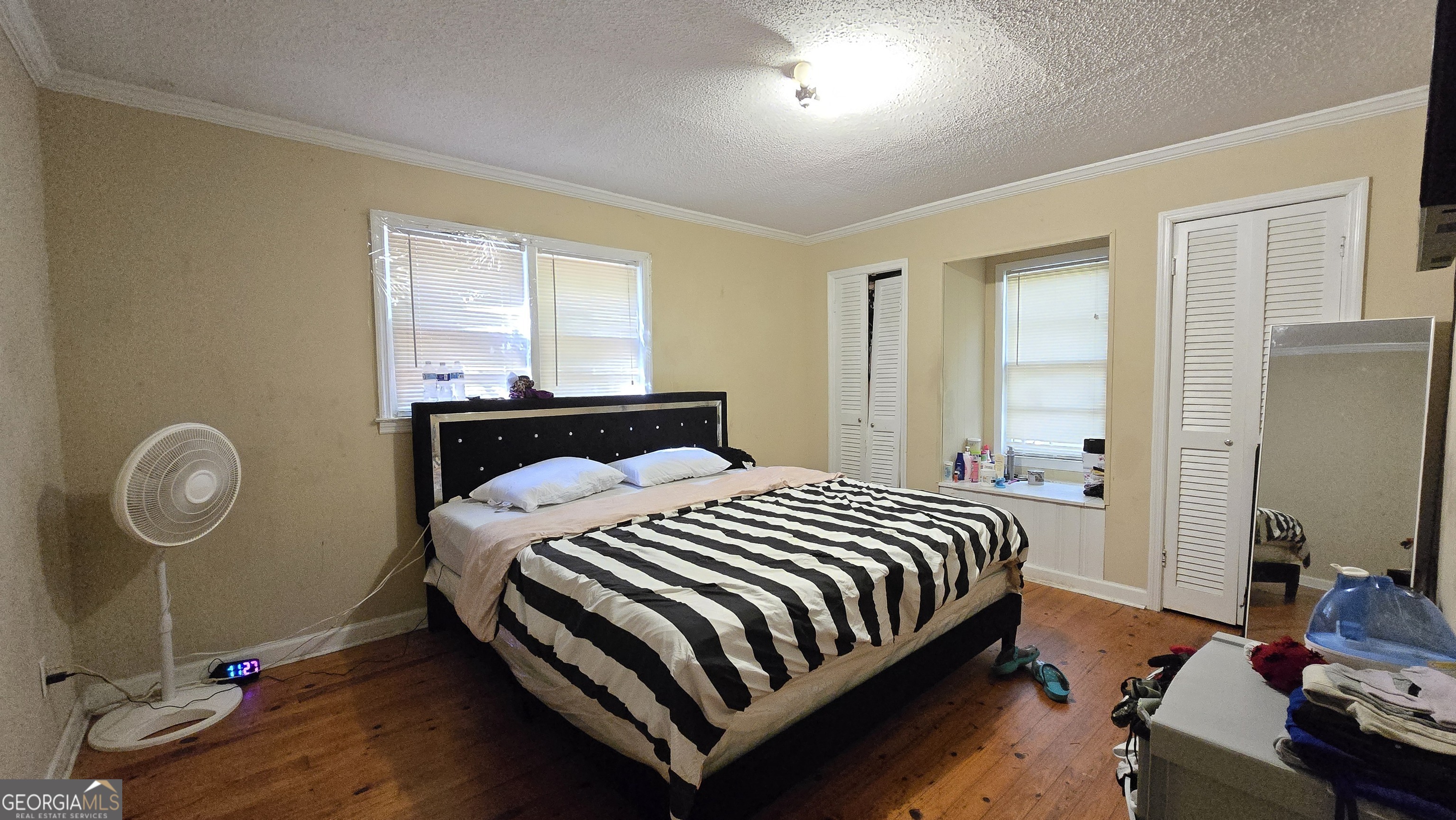 377 Dock Hyde Road Carrollton, GA 30116 - Photo 10 of 31 a bedroom with a bed and a window