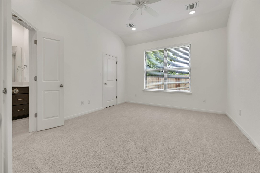 2776 Messenger Way Bryan, TX 77803 - Photo 11 of 16 an empty room with windows and closet