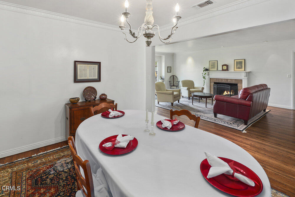 3657 Thorndale Road Pasadena, CA 91107 - Photo 11 of 44 a bedroom with furniture and a chandelier