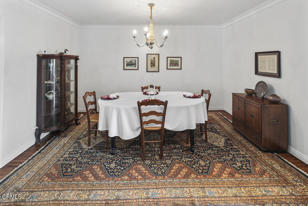 3657 Thorndale Road Pasadena, CA 91107 - Photo 12 of 44 a view of a dining room with furniture wooden floor and a rug
