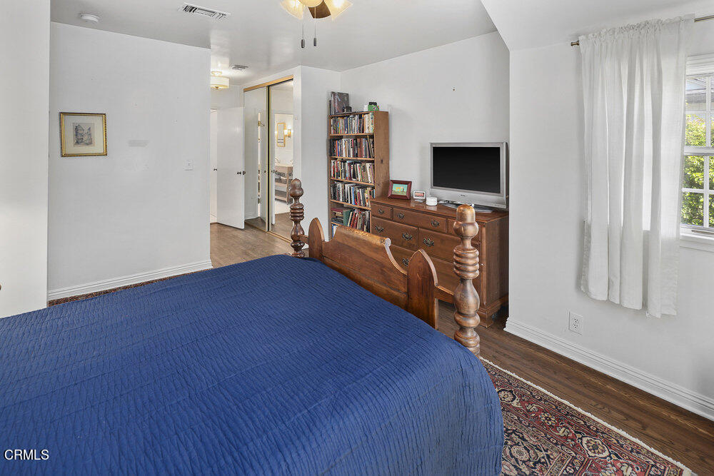 3657 Thorndale Road Pasadena, CA 91107 - Photo 25 of 44 a living room with furniture and a flat screen tv