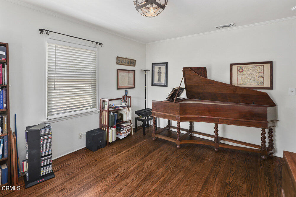 3657 Thorndale Road Pasadena, CA 91107 - Photo 36 of 44 a living room with furniture and a wooden floor