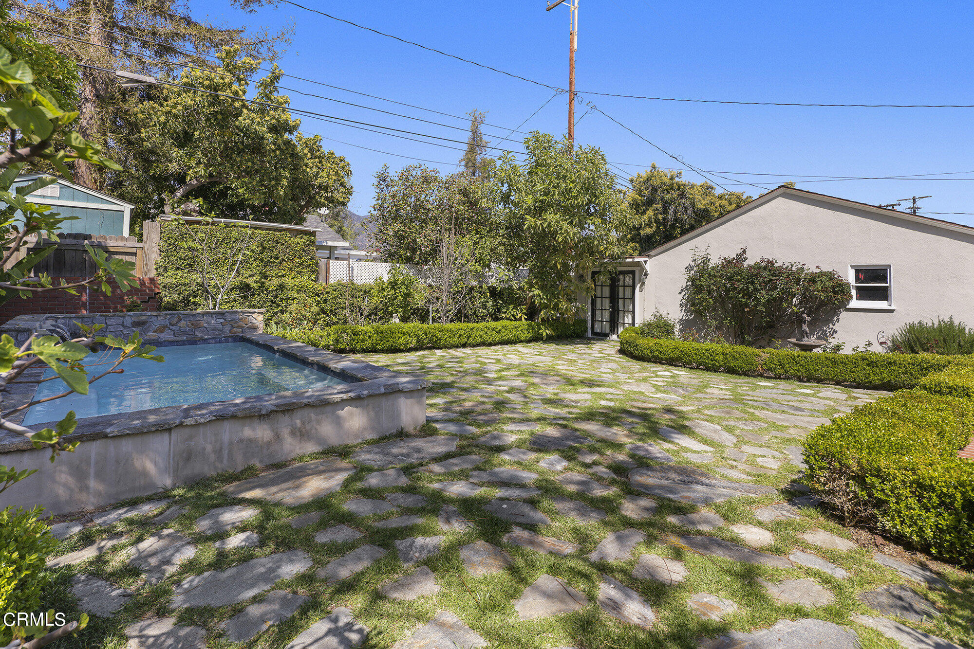 3657 Thorndale Road Pasadena, CA 91107 - Photo 41 of 44 a front view of a house with a yard
