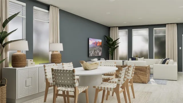 a dining room with furniture and wooden floor