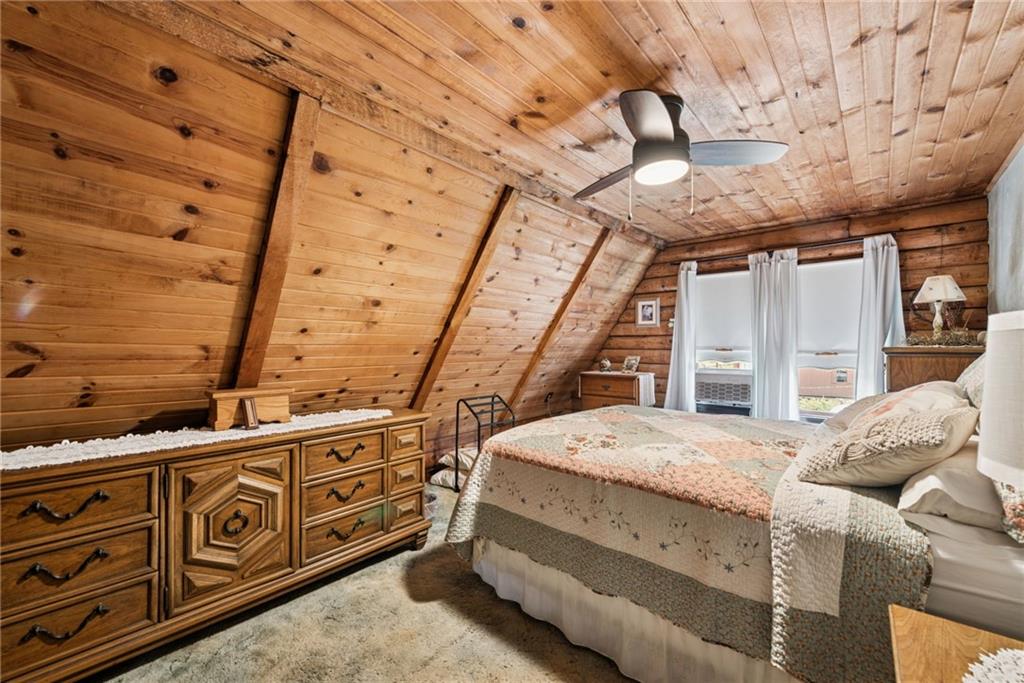 123 Crestview Drive Acme, PA 15610 - Photo 11 of 20 a bedroom with a bed next to a window