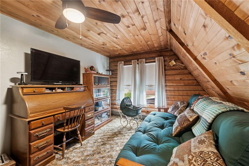 123 Crestview Drive Acme, PA 15610 - Photo 13 of 20 a living room with furniture and a flat screen tv