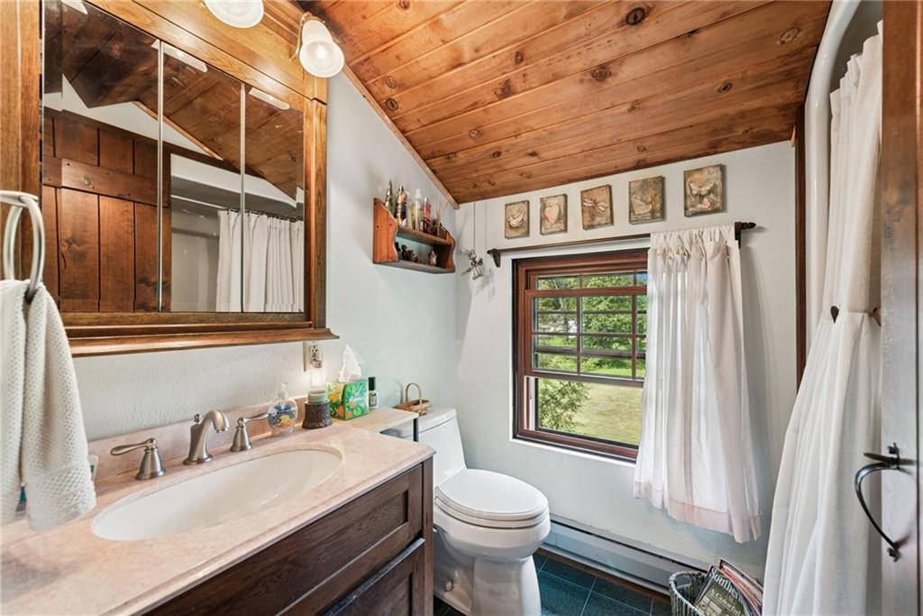 123 Crestview Drive Acme, PA 15610 - Photo 17 of 20 a bathroom with a sink a toilet and shower