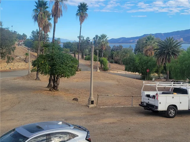 a view of a car parked on the road