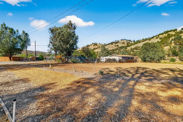 a view of an outdoor space and a yard