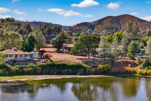 a view of a lake with a mountain in the background