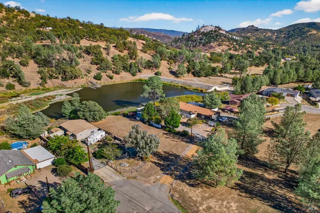a view of a houses with a yard