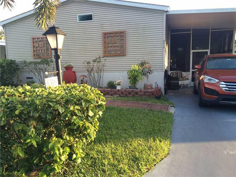 8318 East Club Road Boca Raton, FL 33433 - Photo 1 of 8 Exterior Front.