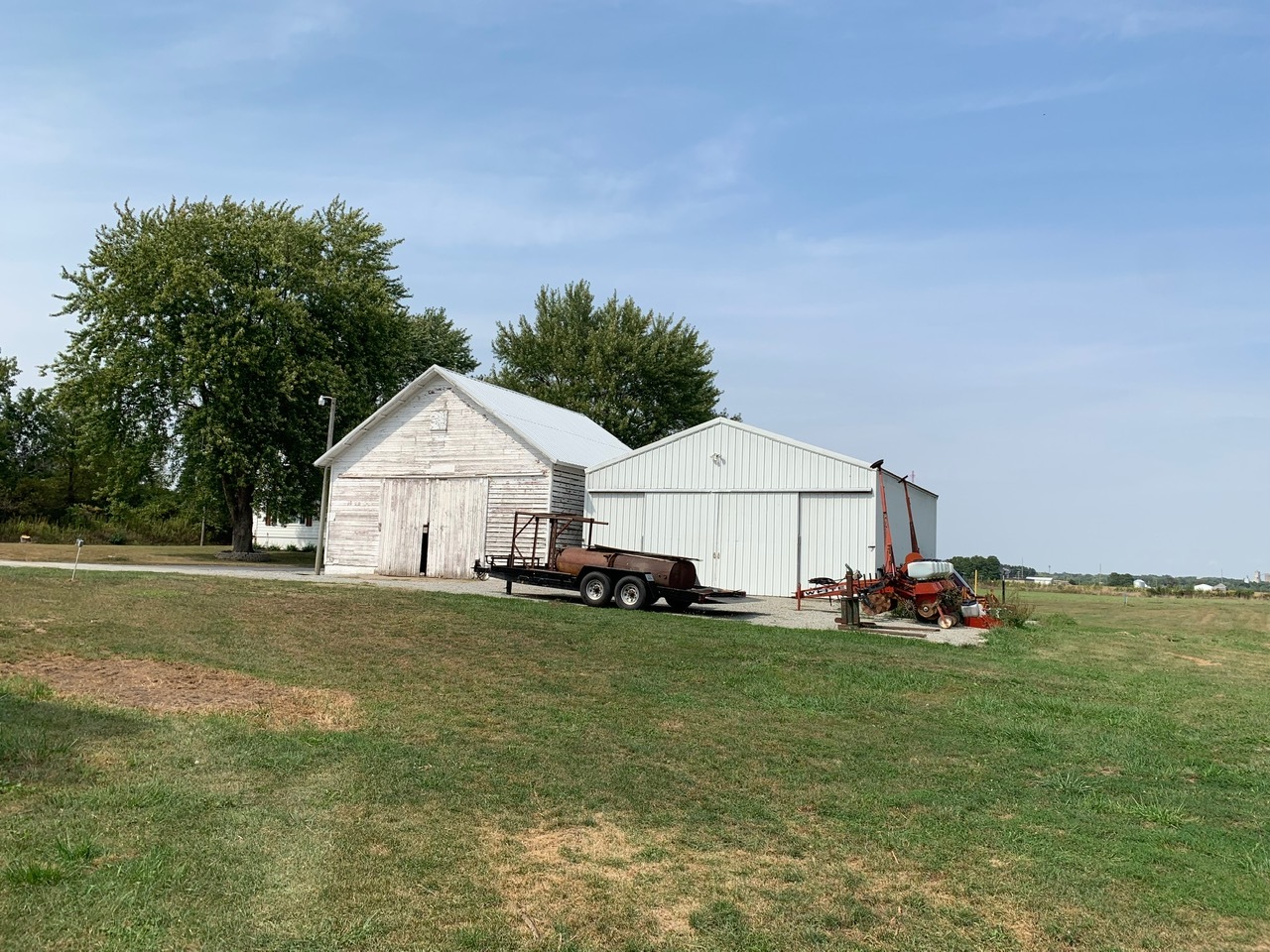 13920 Crosby Road Morrison, IL 61270 - Photo 24 of 30 a view of a house with a yard and garage