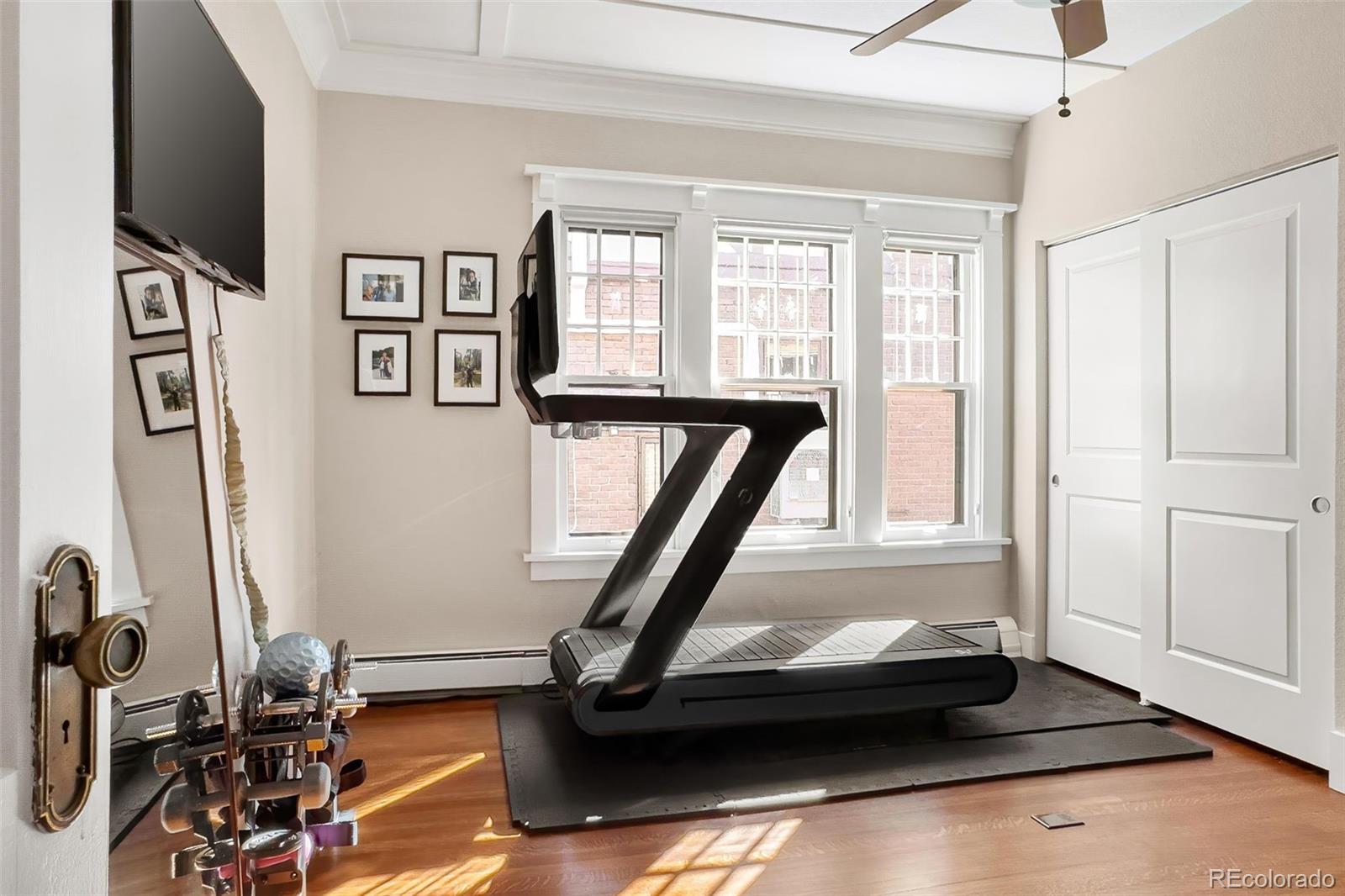 910 Steele Street Denver, CO 80206 - Photo 16 of 33 a view of a room with gym equipment