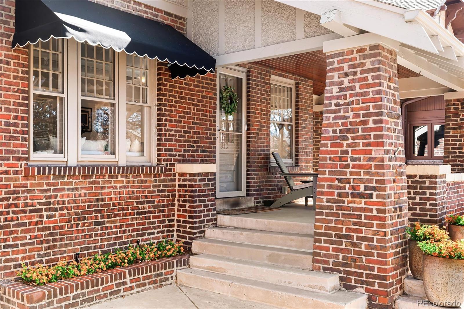 910 Steele Street Denver, CO 80206 - Photo 3 of 33 a view of a brick building with many windows