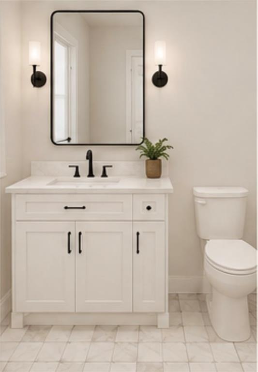 1730 Stargazer Court Denison, TX 75020 - Photo 4 of 9 a bathroom with a sink vanity and toilet
