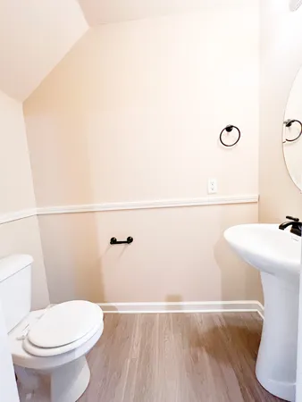a bathroom with a toilet and a sink