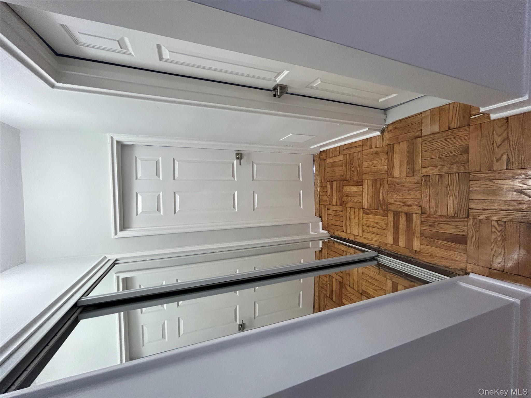 230 Pelham Road, Unit 1O New Rochelle, NY 10805 - Photo 9 of 29 a view of an entryway