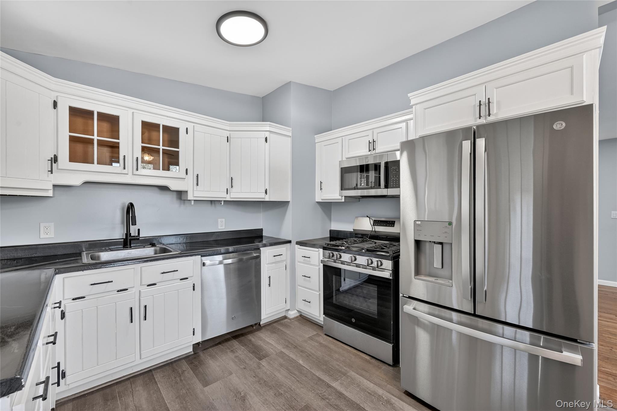 2 The Curve Road Rock Hill, NY 12775 - Photo 11 of 31 a kitchen with stainless steel appliances granite countertop a stove a sink and a refrigerator
