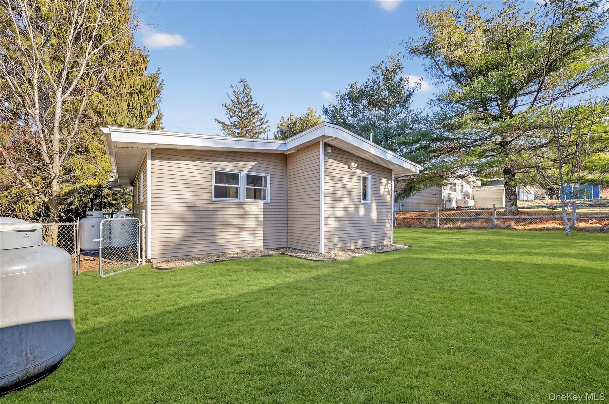 2 The Curve Road Rock Hill, NY 12775 - Photo 29 of 31 a view of a house with a yard and porch