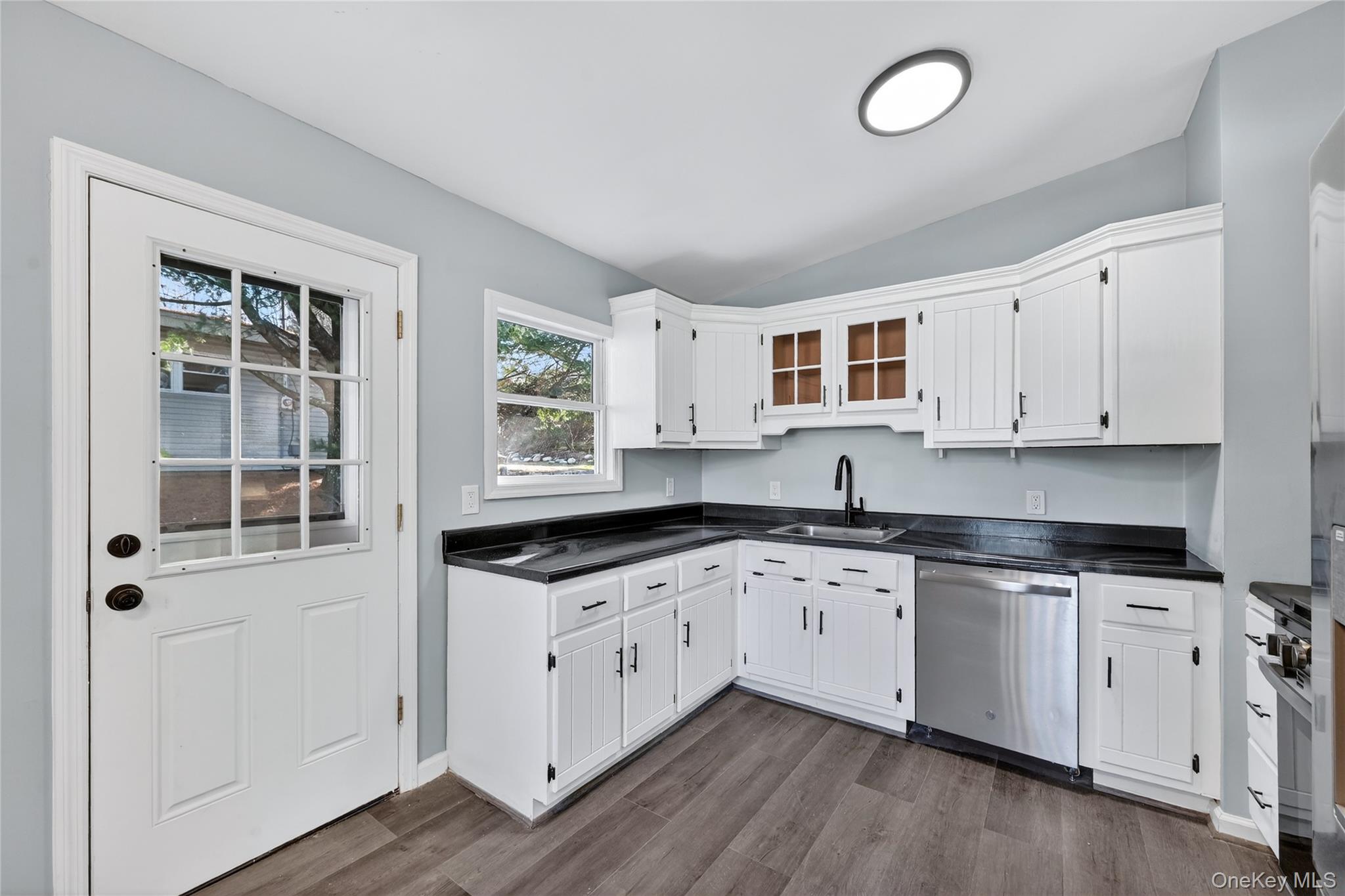 2 The Curve Road Rock Hill, NY 12775 - Photo 8 of 31 a kitchen with granite countertop a sink and cabinets