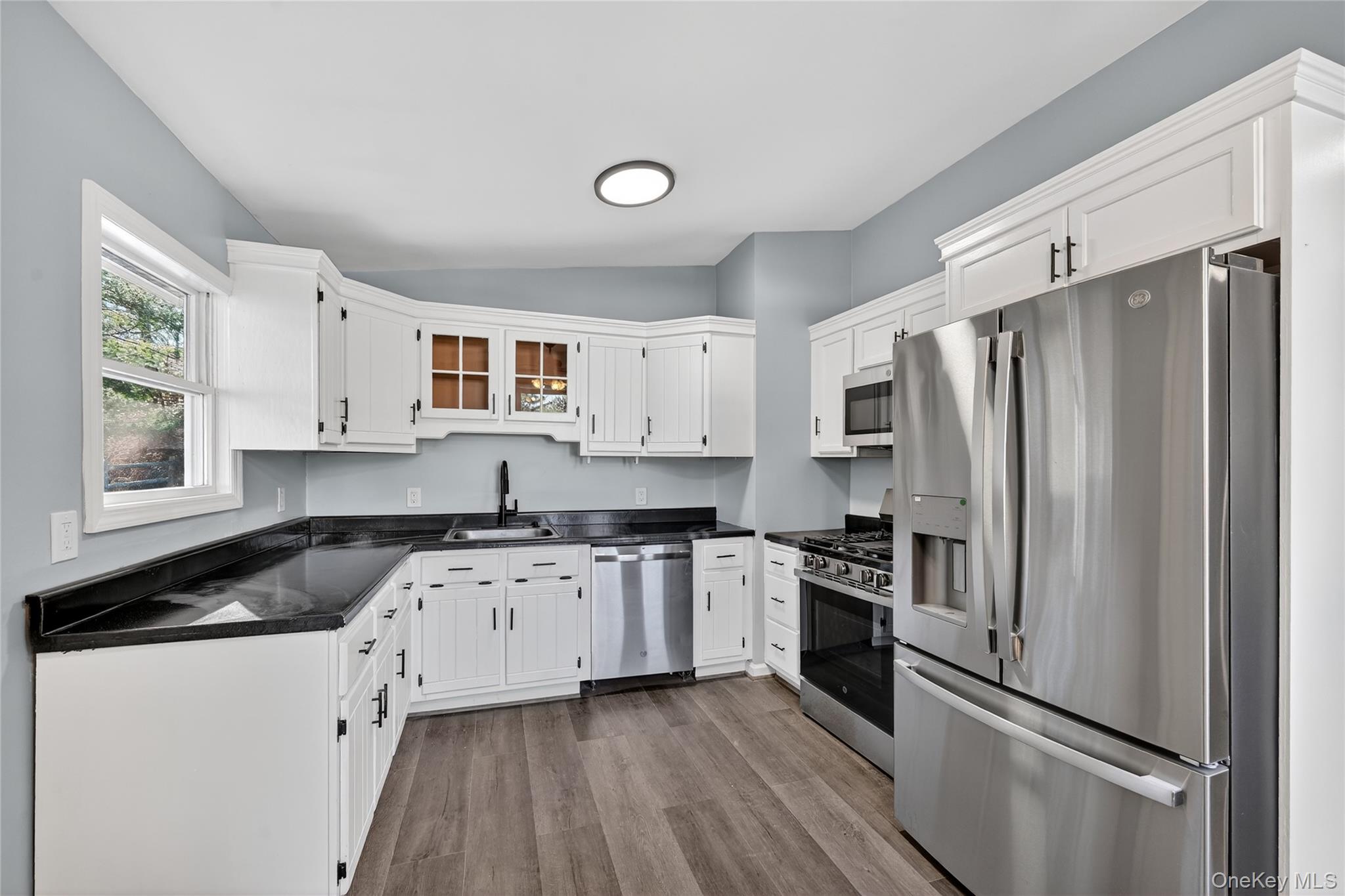 2 The Curve Road Rock Hill, NY 12775 - Photo 10 of 31 a kitchen with granite countertop a refrigerator stove and sink