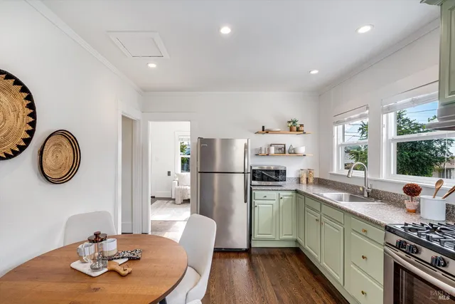 a view of living room and wooden floor