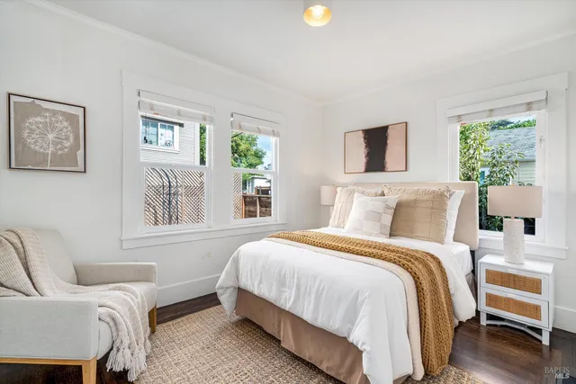 a bedroom with a bed and a couch