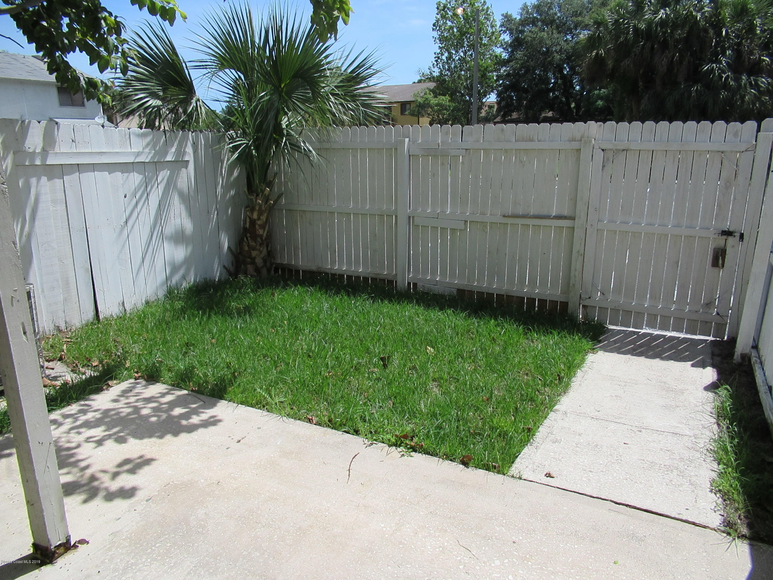 4015 Tree Ridge Lane Northeast Palm Bay, FL 32905 - Photo 2 of 15 Back Yard