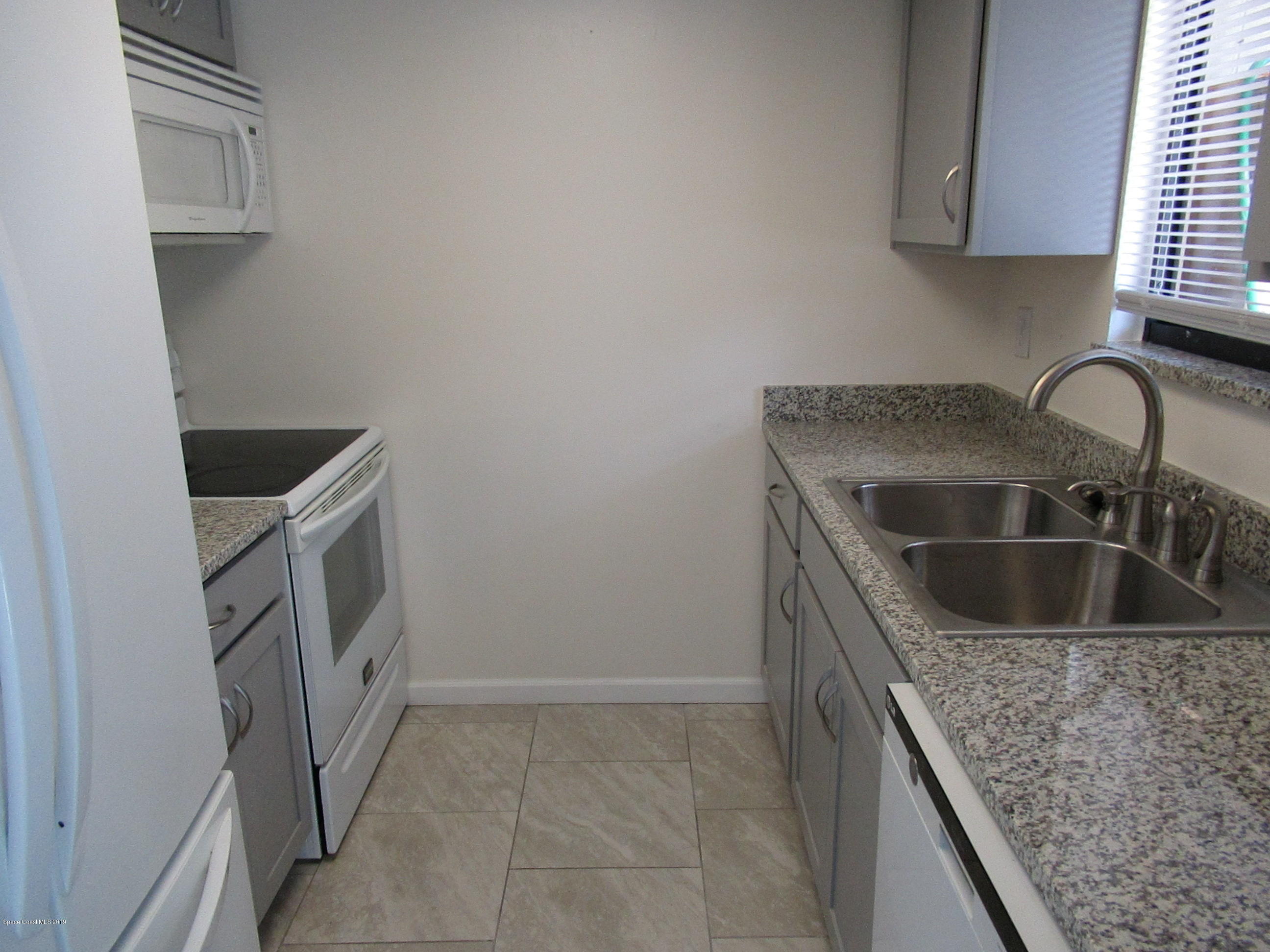 4015 Tree Ridge Lane Northeast Palm Bay, FL 32905 - Photo 4 of 15 Kitchen